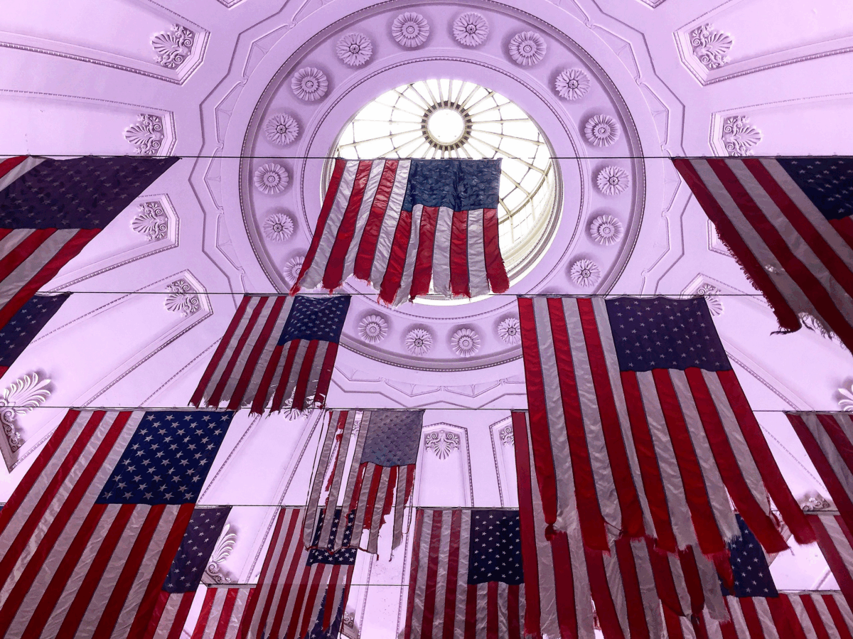 Federal Hall with American flags.